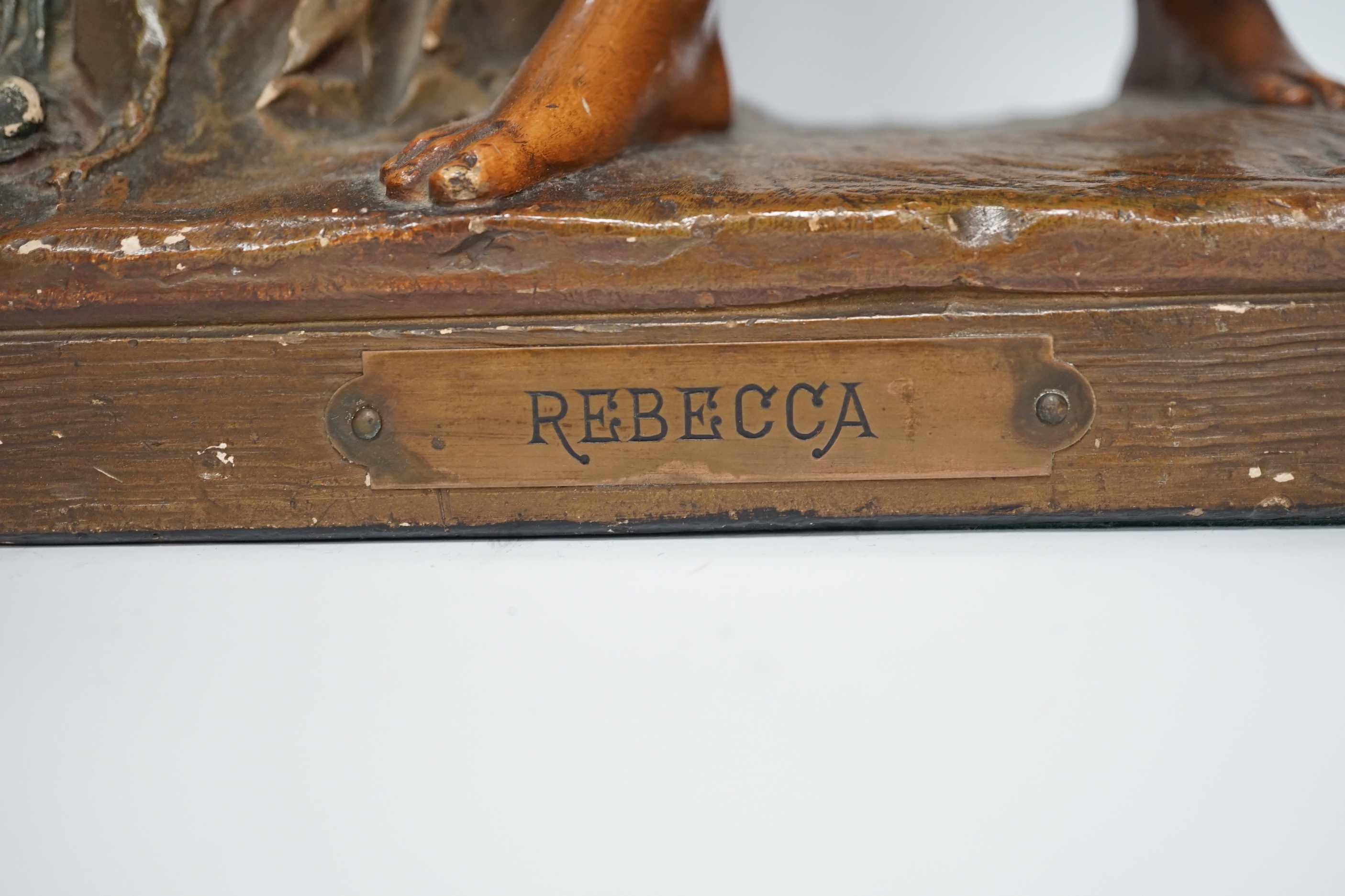 A painted plaster figure of Rebecca at the well, 58cm high